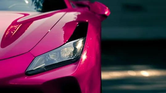 close detail of wrap work — film edge, texture or trim