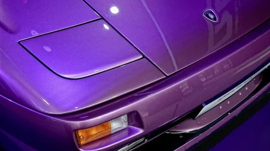 close detail of wrap work — film edge, texture or trim
