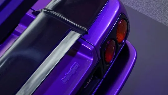 close detail of wrap work — film edge, texture or trim