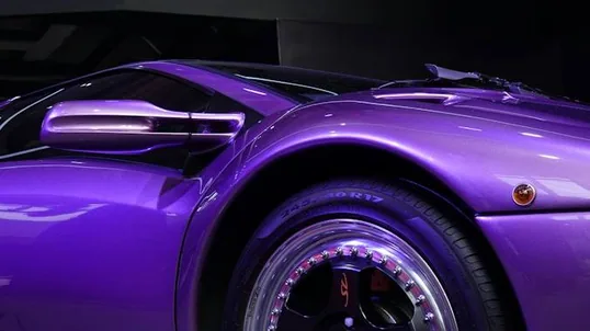 close detail of wrap work — film edge, texture or trim
