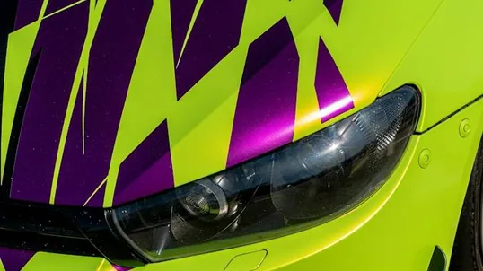 close detail of wrap work — film edge, texture or trim