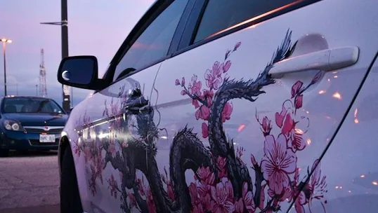 close detail of wrap work — film edge, texture or trim