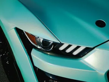 close detail of wrap work — film edge, texture or trim