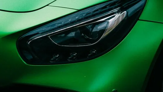 close detail of colour change wrap work — film edge, texture or trim