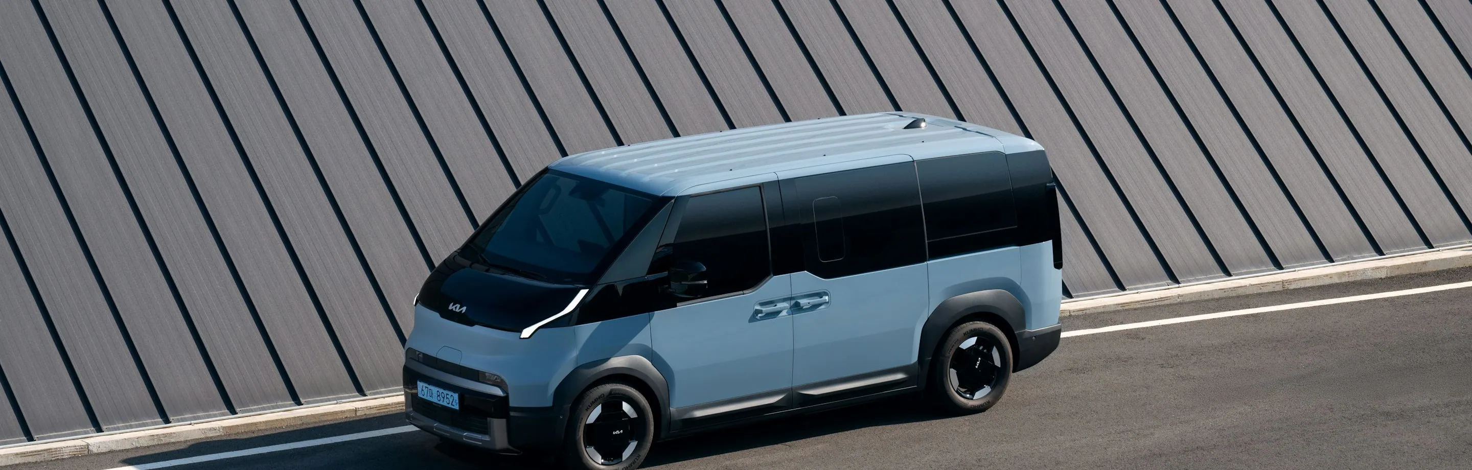 a wrapped van, side-on, wide
