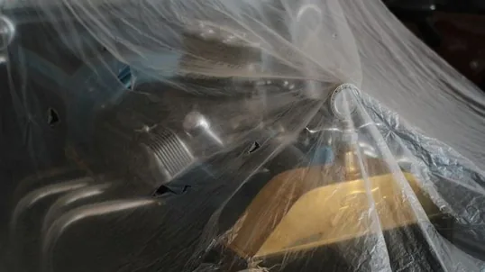 close detail of paint protection film work — film edge, texture or trim