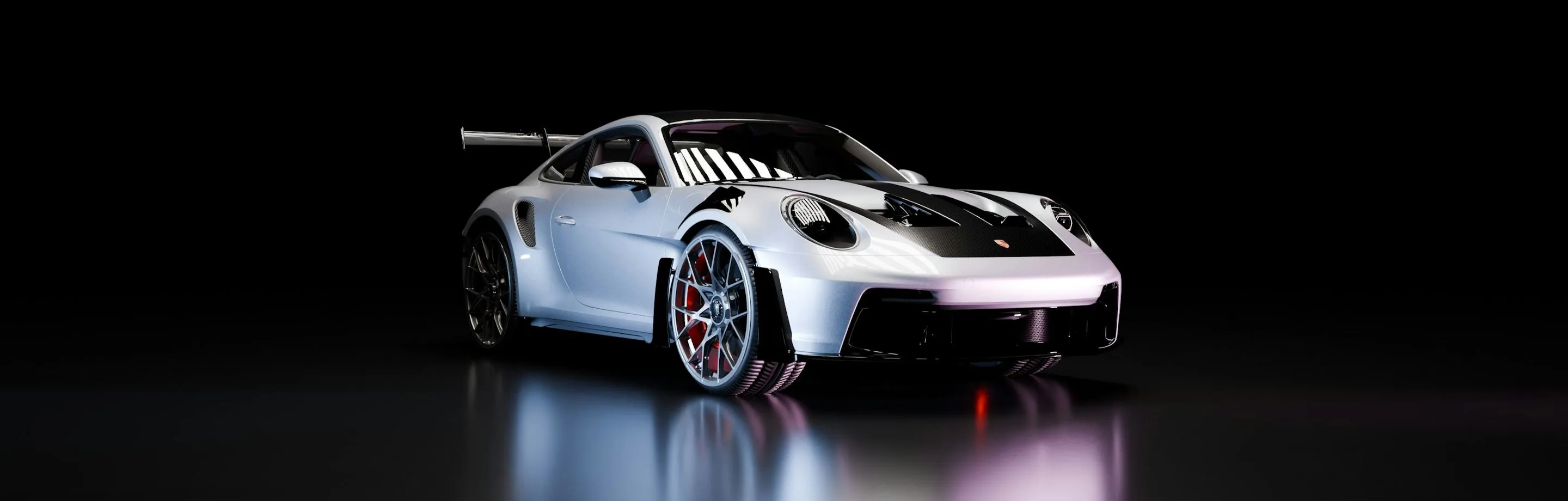 a glossy car under studio light, wide